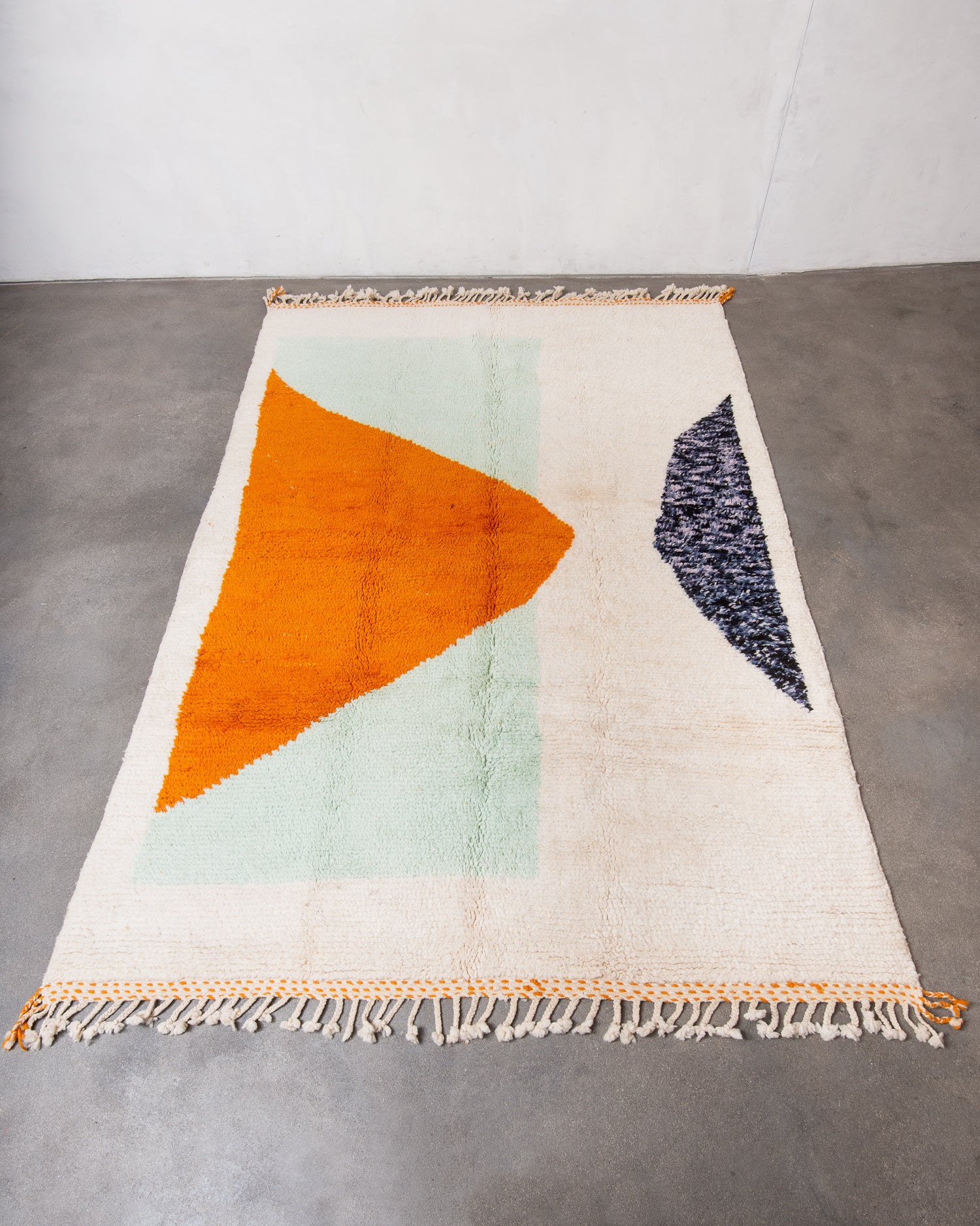 Modern, designer, handcrafted Berber rug from Morocco. Beniourain carpet with beautiful colours and patterns and fluffy wool texture.
